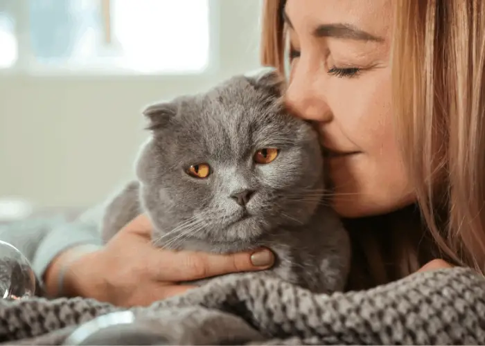 lady hugged her cat